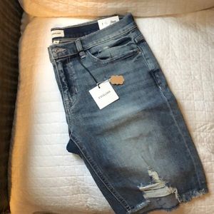 Sneak Peek 8” Mid-rise Distressed Shorts